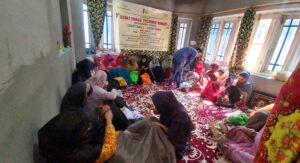 Group of artisans and participants at the Design & Technical Development Workshop reviving Sozni craft through traditional embroidery techniques